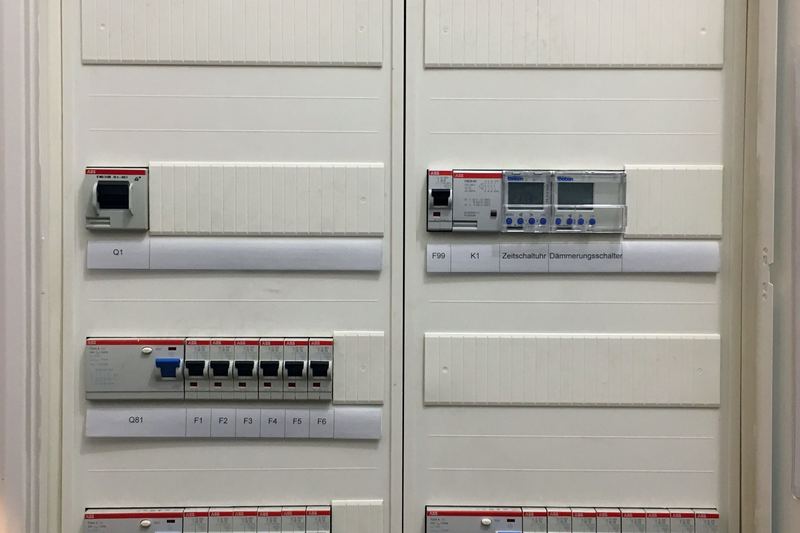 Fuse box with contactor and time switch